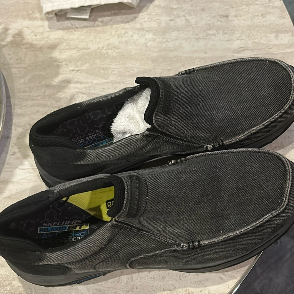 Sketchers steady grip slide ons. Worn one time. Perfect condition.